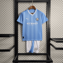 Manchester City 23/24 Kit Criança Principal