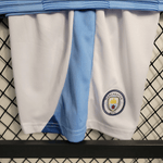 Manchester City 23/24 Kit Criança Principal